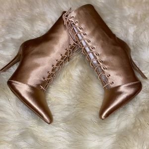 Champagne point to booties.